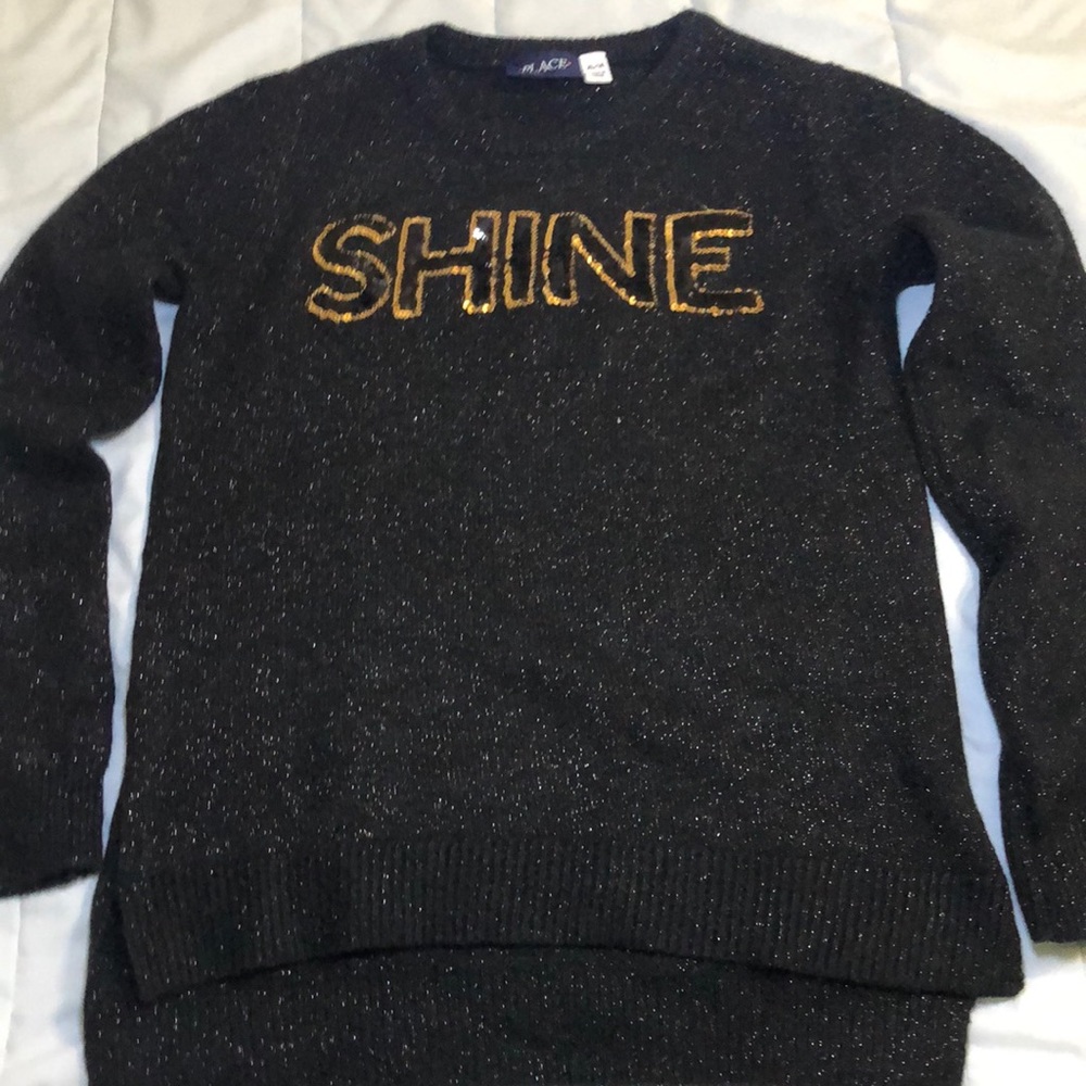 Perfect for parties and cooler weather! Girls black sweater size 14